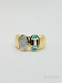 Anello oro 18 kt topazio azzurro e diamanti ct0.30