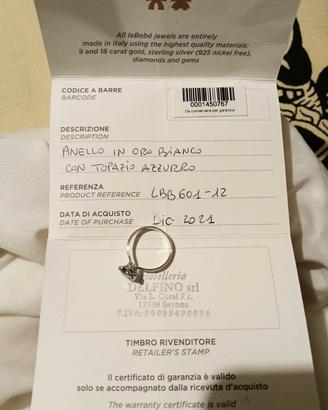 Anello con topazio azzurro oro bianco