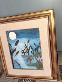 Quadro con cornice dorata 