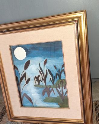 Quadro con cornice dorata 