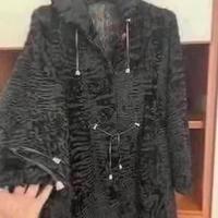 Pelliccia donna in vero Astrakan color nero nuova