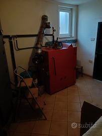 Impianto  di riscaldamento a caldaia a legna