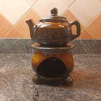 Bruciaessenze a forma di teiera su fornello