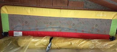 Barra protezione per lettino bambini