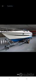 Barca completa di: motore carrello accessori.