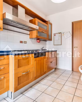 Cucina Snaidero completa, ciliegio e quarzite blu