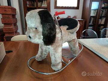 cagnolino a dondolo di peluche 