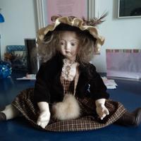 Bambola in ceramica e porcellana