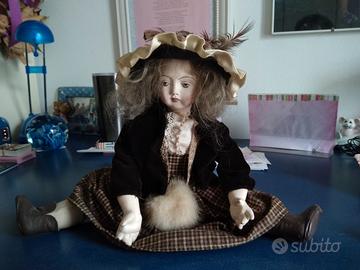 Bambola in ceramica e porcellana