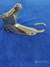 Appendino in fusione bronzo a testa di cavallo