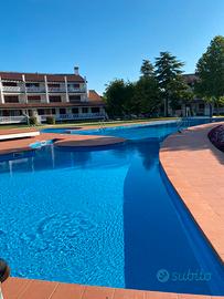 Appartamento a Caorle con piscina e giardino
