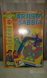 Gioco artista con la sabbia