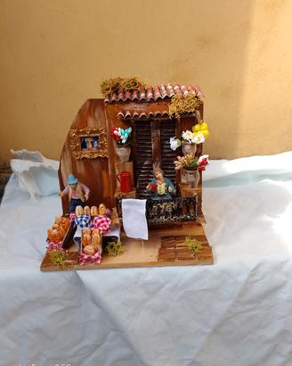 presepe lavorazione artigianale scena venditore di