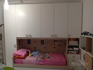 cameretta con libreria 3,00mt  x h2,62