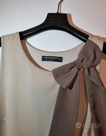 camicetta beige e marrone senza maniche