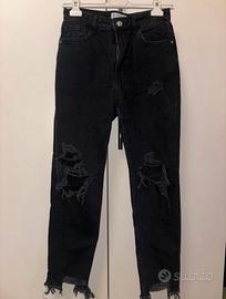 Jeans neri strappati