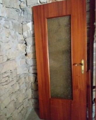 Porta interno con vetro usata.