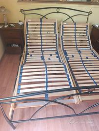 Letto ferro battuto-reti singole motorizzate