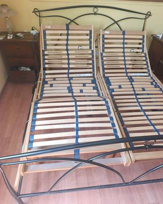 Letto ferro battuto-reti singole motorizzate