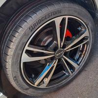 cerchi 17 gomme bridgestone polo neri diamantati v