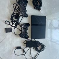 PlayStation 2 slim completa di joystick e memory