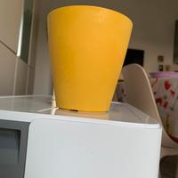 Coprivaso diametro 13, altezza 13 cm.