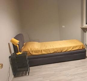 letto imbottito e secondo letto scorrevole