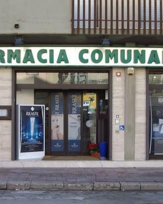 Insegna, cassettiera e distributore per farmacia 
