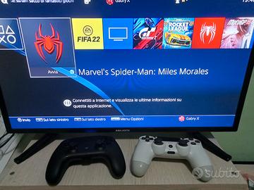 PlayStation 4 + 12 giochi + 2 controller