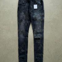 Amiri Chemist leather star aged jeans