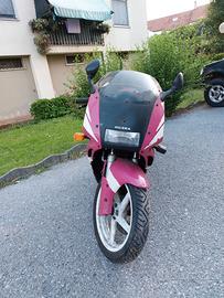 Moto e anni 90