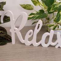 Scritta Relax da arredamento in PVC bianco 30 cm