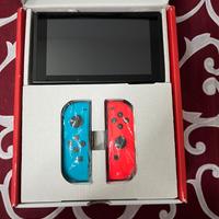 Nintendo switch con scatola e gioco Mario party