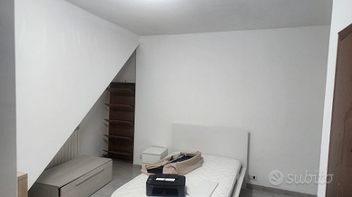 Stanza con bagno in camera