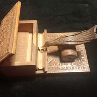 Distributore di sigarette vintage a forma di uccel