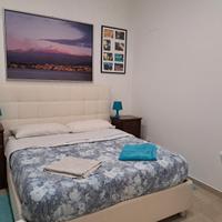 letto bianco in'ecopelle con contenitore