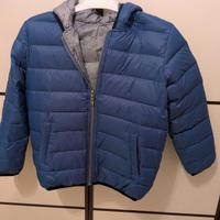 Giubbotto e maglietta aperta 