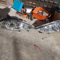 fanali completi anteriore peugeot cabrio