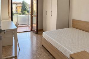 Stanza singola con balcone privato