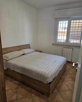 Ardea bilocale arredato con balcone/box auto