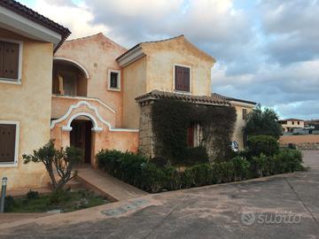 Appartamento con giardino Cannigione -I.U.N. T4142