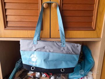 Borsa in tessuto con logo Fortesan e zampa.