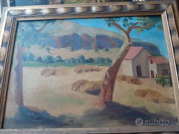 Paesaggio rurale con covoni di grano e casolari