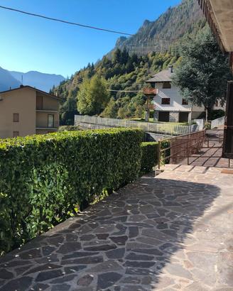 Bilocale con terrazza solarium e giardino