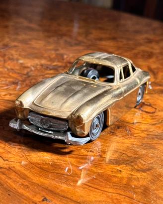Mercedes 300 SL 1954 modellino dorato vintage