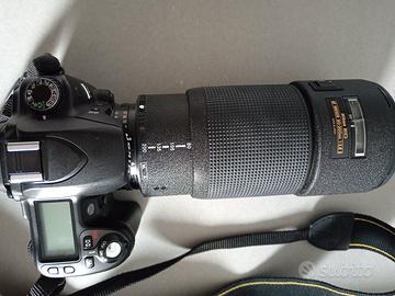 macchina fotografica Nikon + obiettivo 80-200 mm