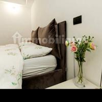 Camera da letto Imab Group e letto Noctis