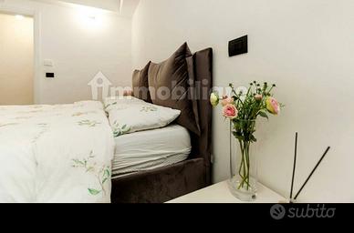 Camera da letto Imab Group e letto Noctis