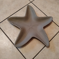 Vassoio stella diametro 35cm cartapesta