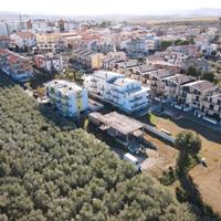 Terreno con fabbricato in costruzione